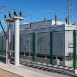 Medium voltage capacitor bank installation on an industrial bus with drive fed switchgear nearby